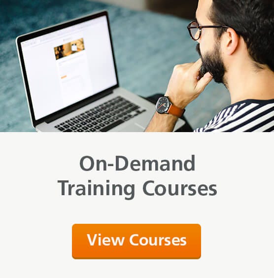Image of a researcher looking at a computer screen with a button below directing to STEMCELL&rsquo;s on-demand training courses